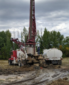 A truck digging a new fresh-water well 